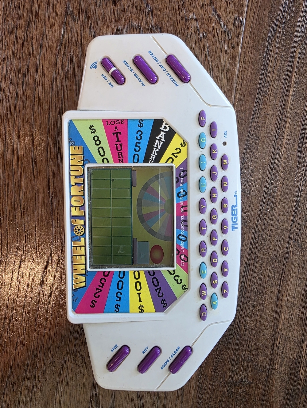 Vintage 1995 Tiger Electronics Wheel of Fortune Handheld Game with Cartridge 7 - Picture 2 of 7